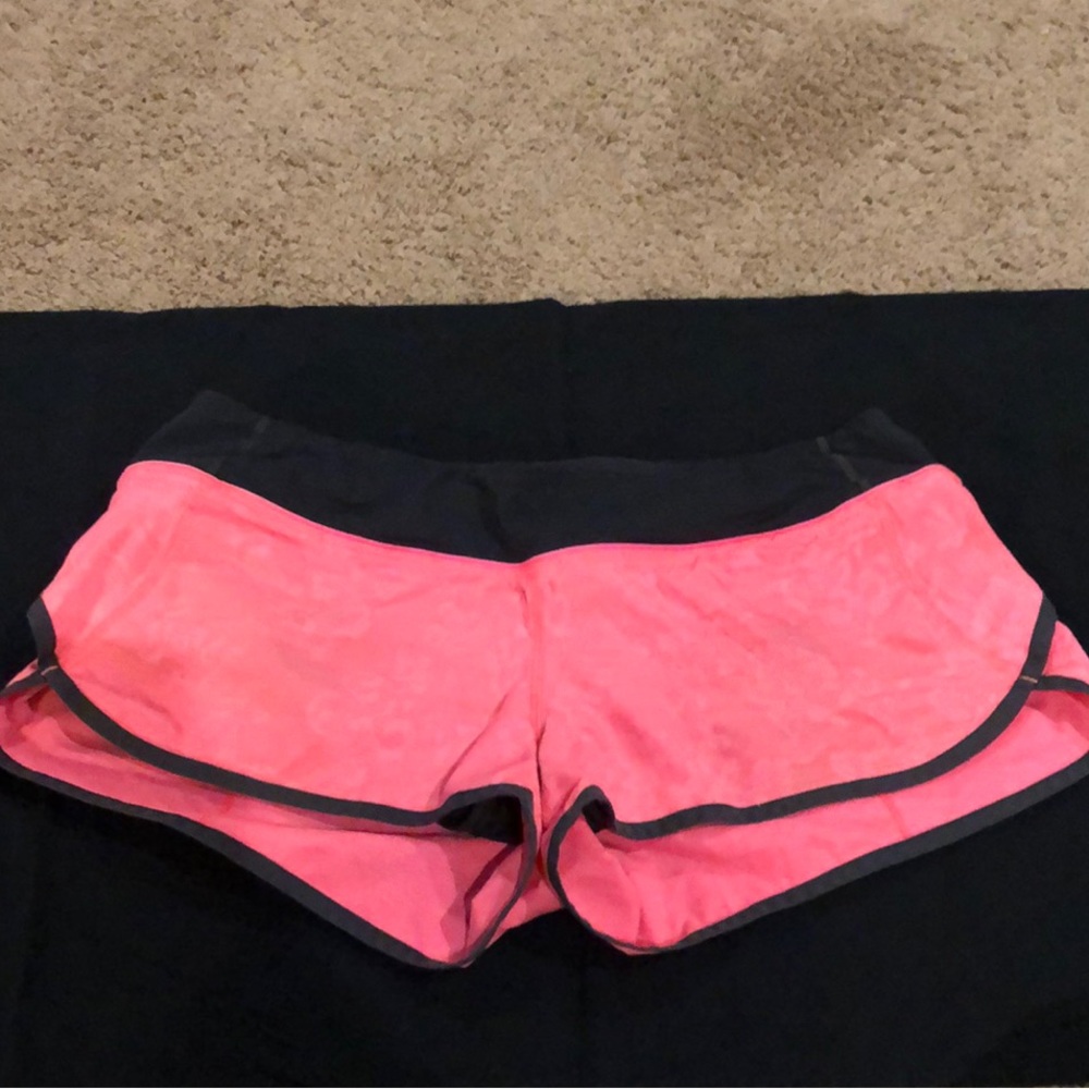 Lululemon pink athletic shorts, black trim: GUC: size 8.